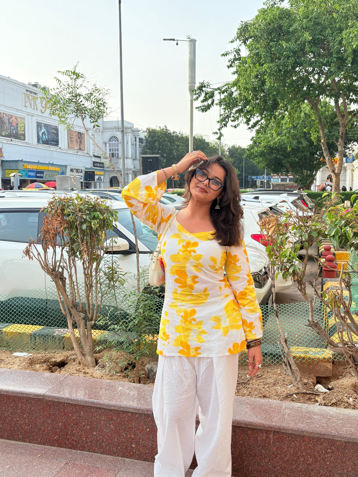 Taara Sandhya yellow floral kurti with white palazzo, full outfit