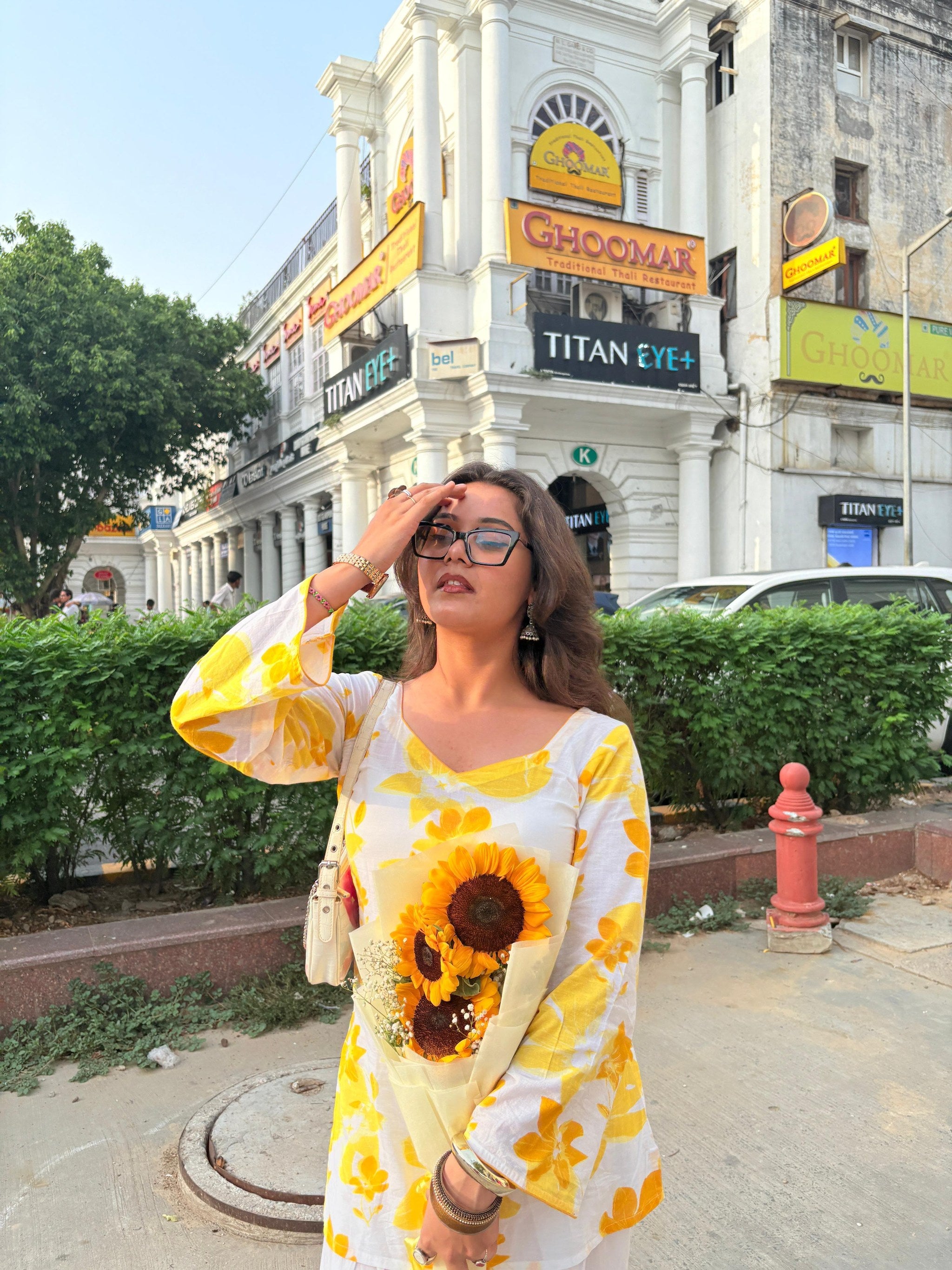 Taara Sandhya yellow floral kurti, close view of the print and bell sleeves